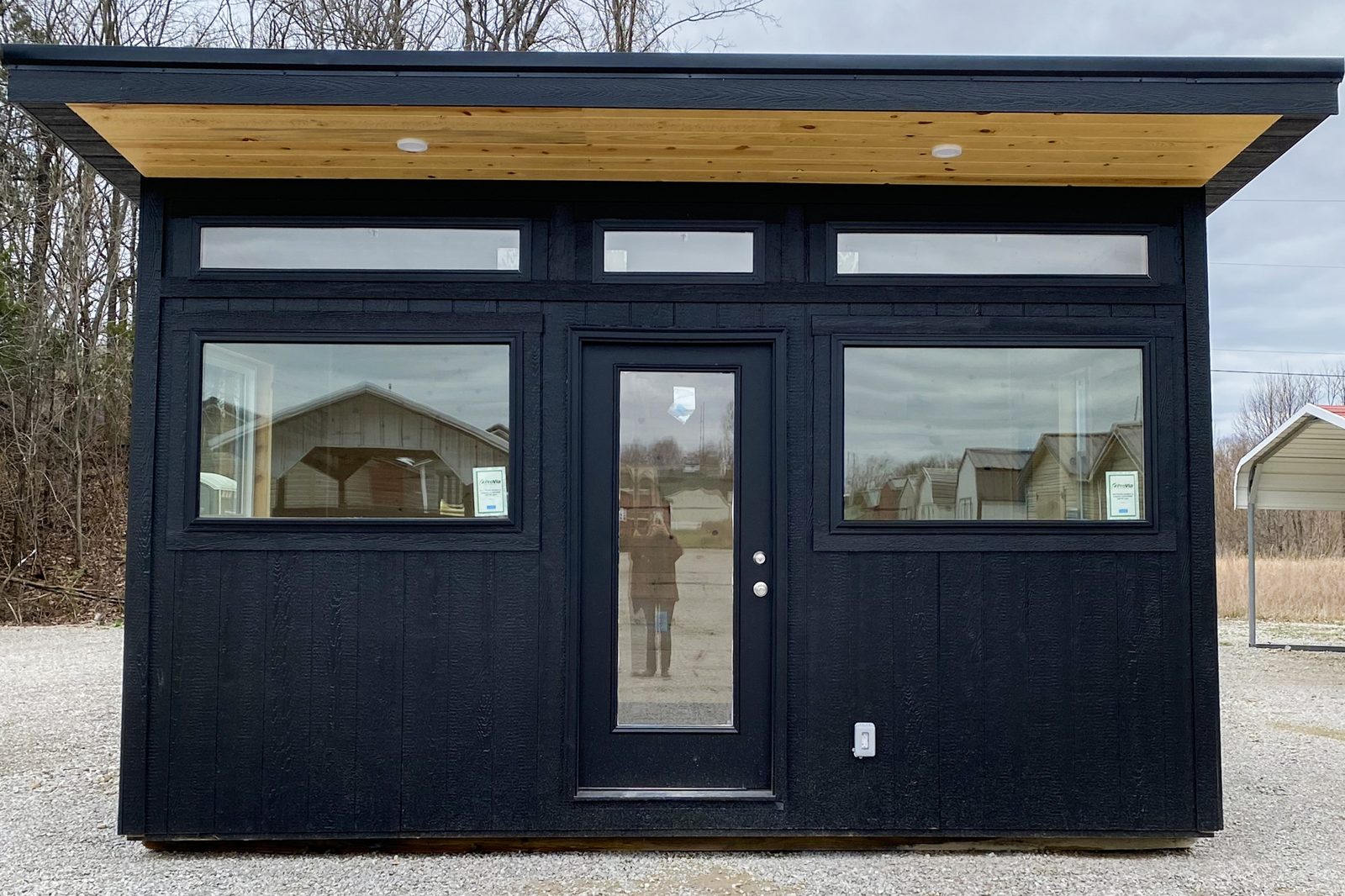A couple using Esh's online 3D shed design tool