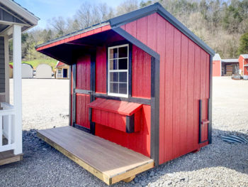 A red and black custom chicken coop for sale in Tennessee