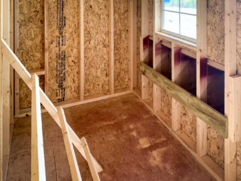 Roosting rack and nesting boxes in a chicken coop for sale in Tennessee