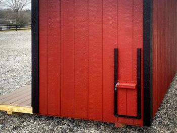 Chicken door on a small chicken house for sale in Kentucky