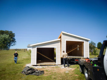 A two-car modular garage in Kentucky being delivered