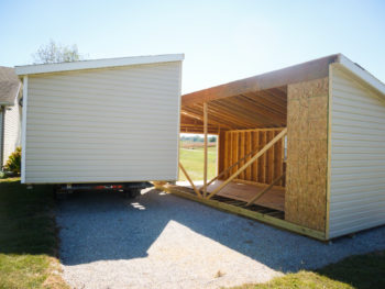 A vinyl modular garage in Kentucky being assembled