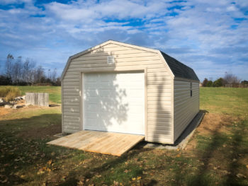 A prebuilt garage in Tennessee with vinyl siding and a ramp