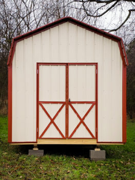 A storage building in Tennessee with metal siding and a loft