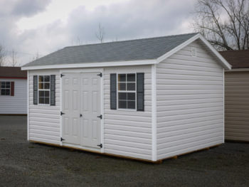 A vinyl shed in Kentucky with windows and vinyl shutters