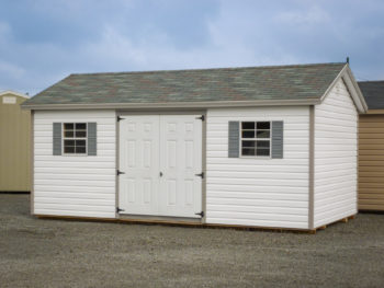 A shed in Kentucky with vinyl siding and vinyl double doors