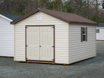 A shed in Kentucky with vinyl siding and double doors on the end