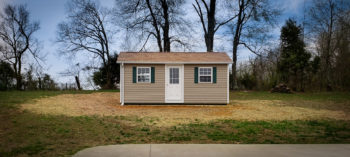 A vinyl shed in Kentucky with windows, and shutters