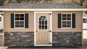 A shed in Tennessee with customized vinyl siding and a shingle roof