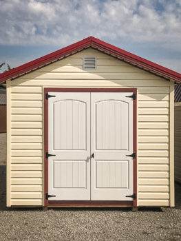 A shed in Tennessee with vinyl siding and double doors