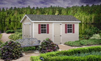 A vinyl shed in Tennessee with double doors and a shingle roof