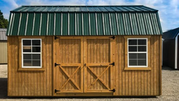 green-roofed barn with stained wood shed siding option