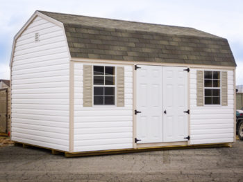 white high barn with vinyl as shed siding option