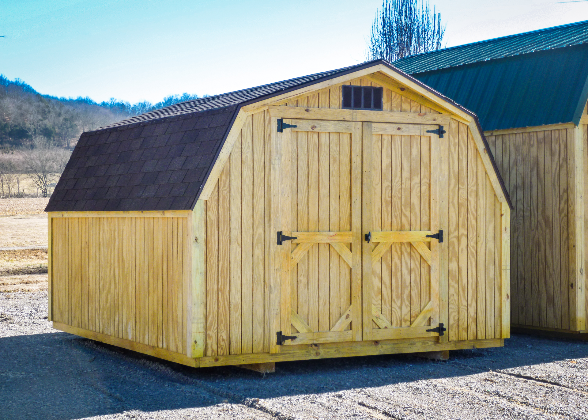 exterior of stained wood shed siding option for sale in KY and TN