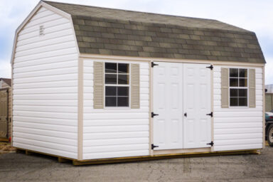 white high barn with vinyl as shed siding option