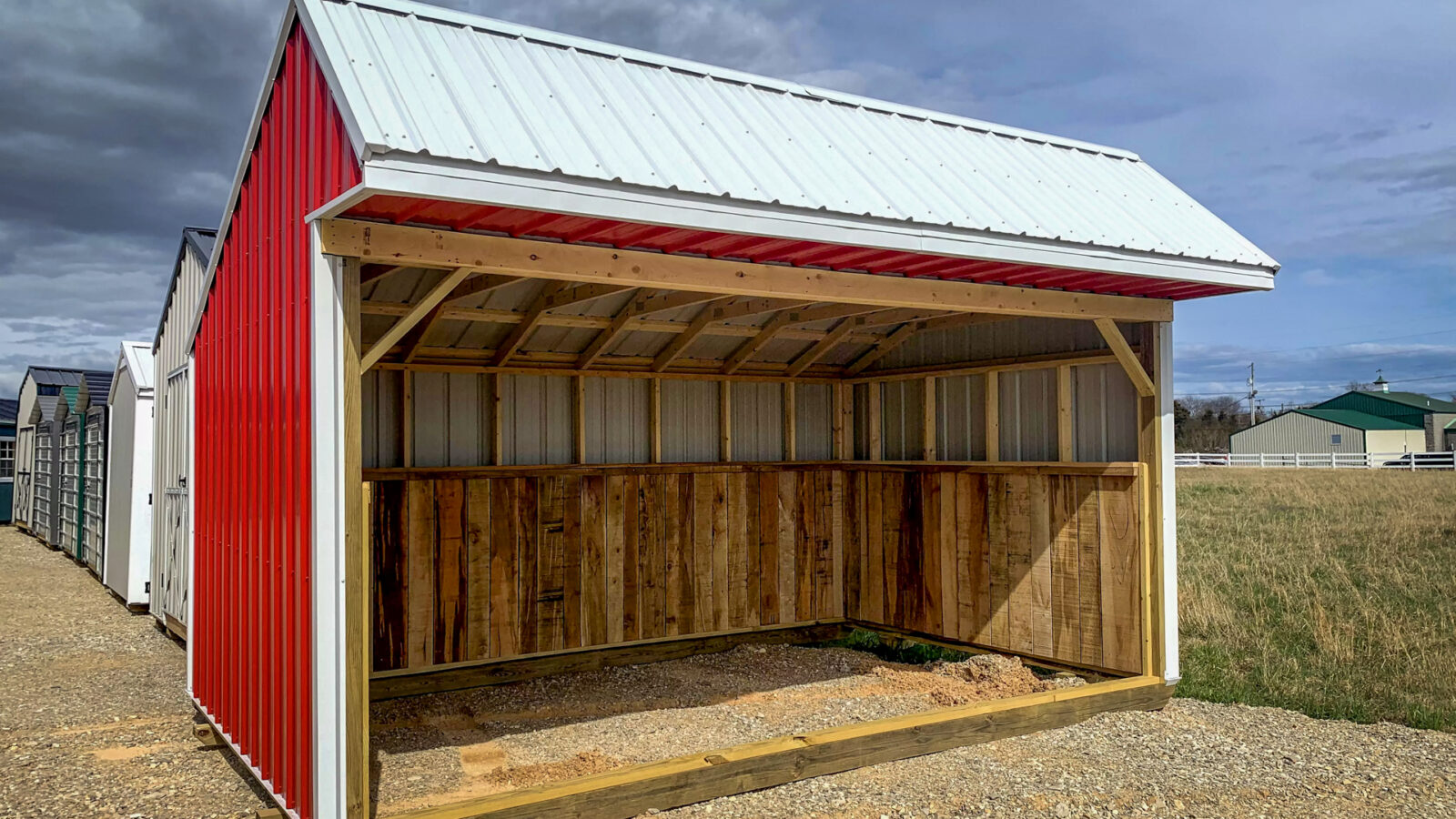 outside of great quality red loafing shed for sale