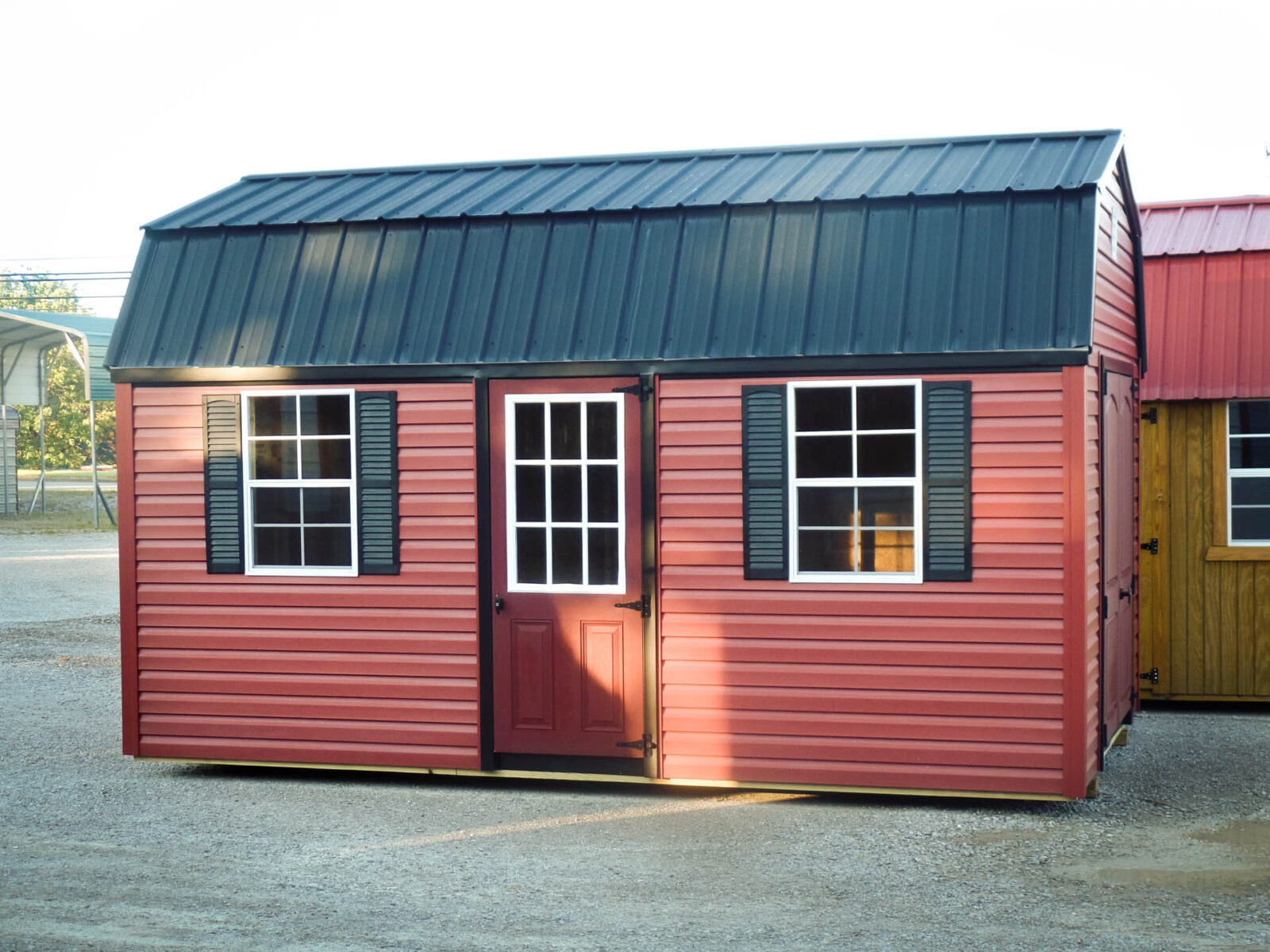 A red wooden man cave shed