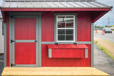 A red prefab animal shelter for sale in Kentucky