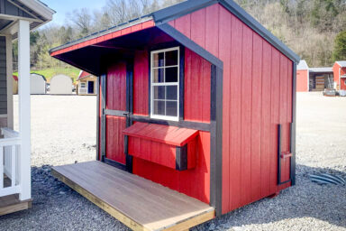 A red and black custom chicken coop for sale in Tennessee