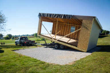 Delivery of a modular prebuilt garage in Kentucky with vinyl siding