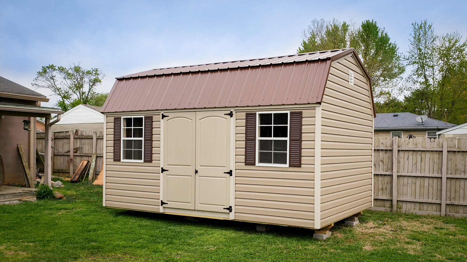 exterior of light brown outdoor tool storage shed for sale in KY and TN