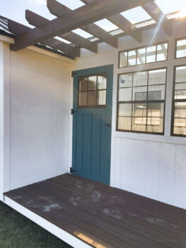 exterior porch of a greenhouse shed by esh's utility buildings